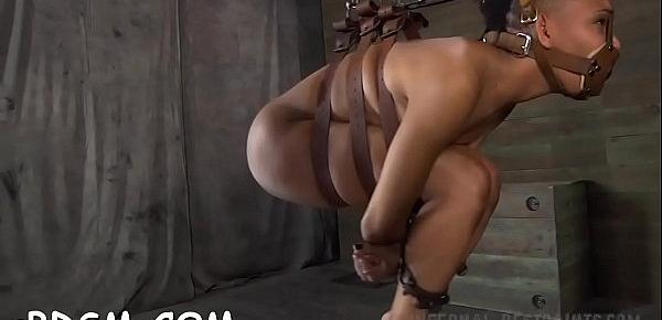  Gorgeous slave bounded with legs spread wide open